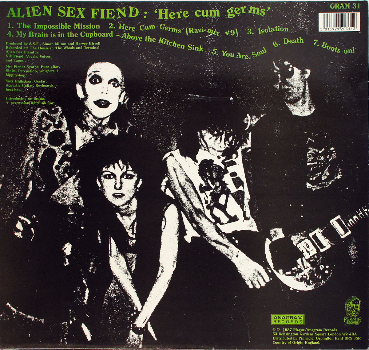 Back cover of Alien Sex Fiend's Here Cum Germs LP featuring high-contrast band photo, lime green tracklist, credits, and barcode.